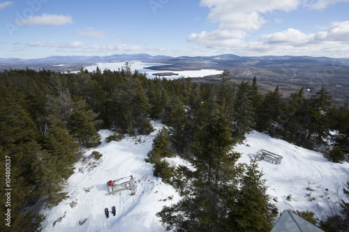 Winter view of an ice covered Cupsuptic Lake, Rangeley, Maine.