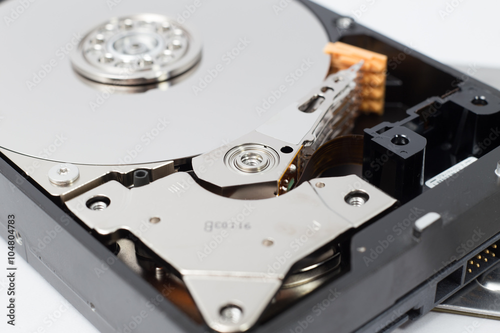 Inside Hard Disk Drive (HDD)-Computer Hardware Components Focus on Actuator Arm. Inside Hard Disk Drive (HDD)-Computer Hardware Components Focus on Actuator Arm.