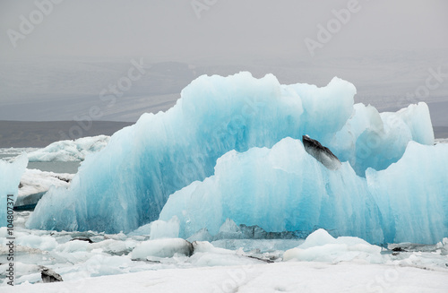 Huge blue floes and icebergs at ice lagoon Jokulsarlon, Iceland