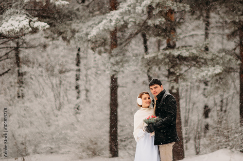 couple in a pine forest