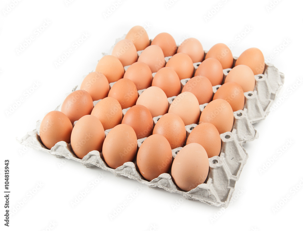 Eggs in paper tray isolated on white