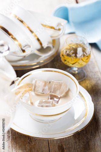 Iced tea with milk and brandy