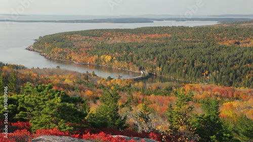 Early morning, aerial pan of Otter Cove, in Acadia National Park, Maine in Autumn. The bridge is part of Park Loop Road (aka Acadia All American Road).