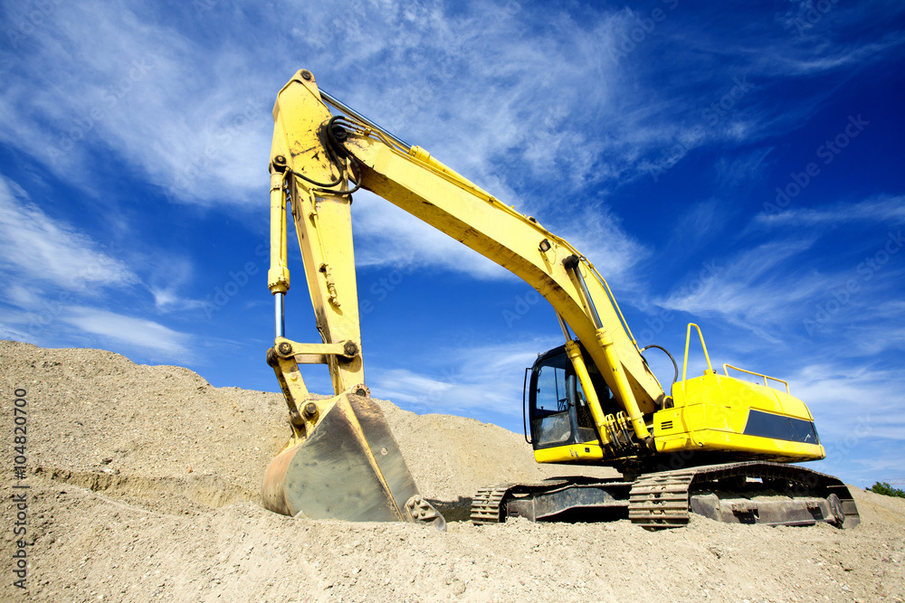 Excavator at construction site Excavator at construction site