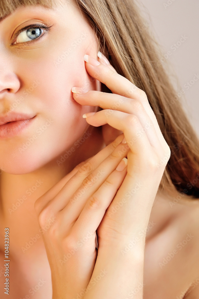 Young beautiful woman. Focus is on a hand Young beautiful woman. Focus is on a hand