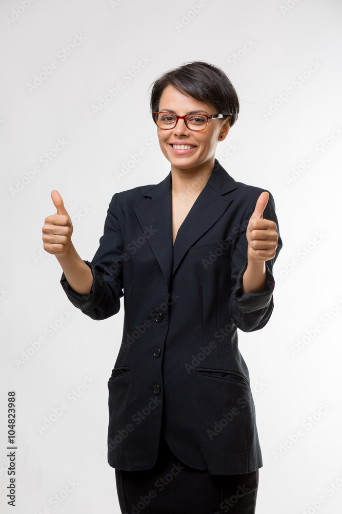 Young attractive business woman in a studio
