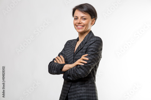 Young attractive business woman in a studio