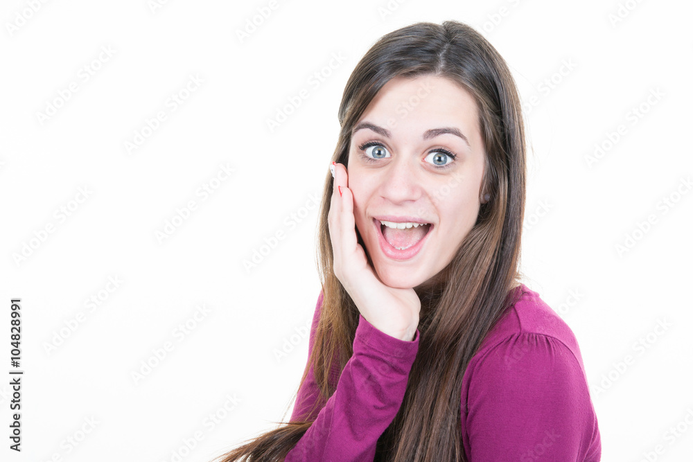 Surprised beautiful girl holding her head in amazement and open-mouthed Surprised beautiful girl holding her head in amazement and open-mouthed