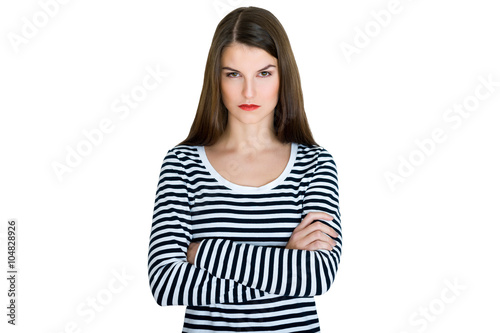 Young serious angry woman portrait on a white background