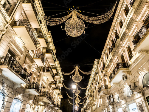 Nizami street in the center of Baku, Azarbaijan,  illuminated by photo