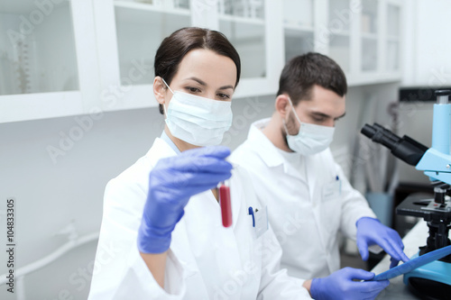 young scientists making test or research in lab