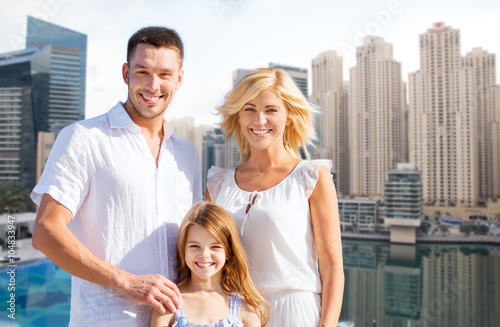 Canvas Print happy family over dubai city background