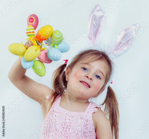 Kid with Easter eggs
