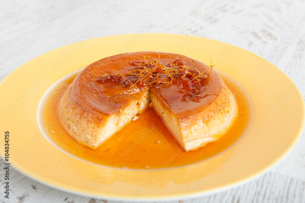 Homemade custard pudding served with caramel Homemade custard pudding served with caramel