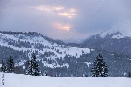 Cloudy winter view in the french alps
