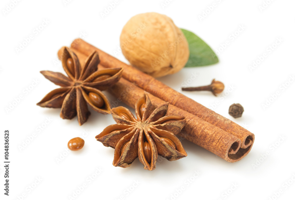 cinnamon sticks and anise star on white cinnamon sticks and anise star on white