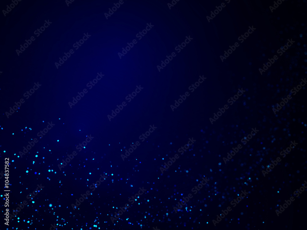 sparkling blue glitter flow in front of a blue background