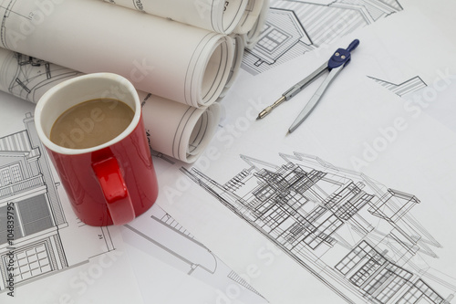 Blueprints with cup of coffee