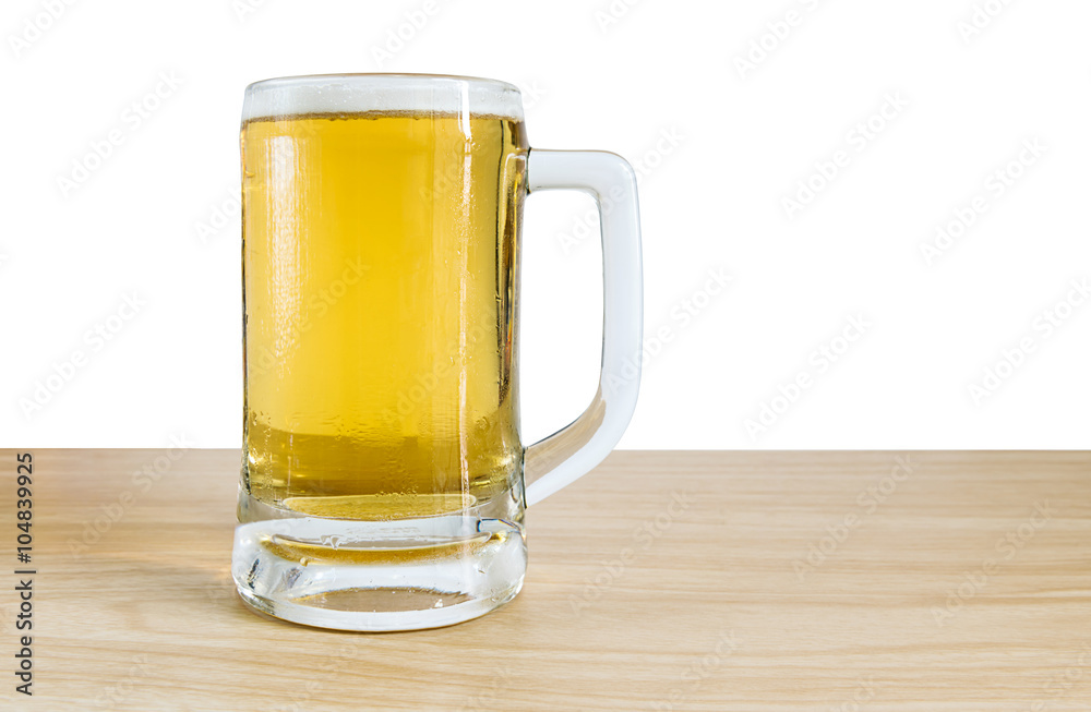 Frosty glass of light beer on wooden with white background Frosty glass of light beer on wooden with white background