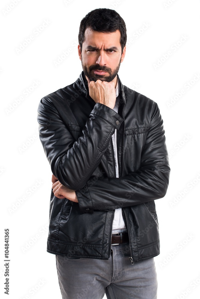 Man with leather jacket thinking Man with leather jacket thinking