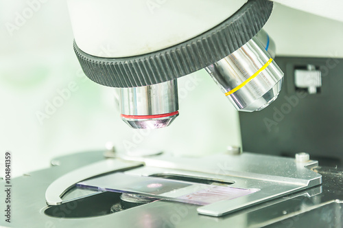 microscope for microscopic organism on the table
