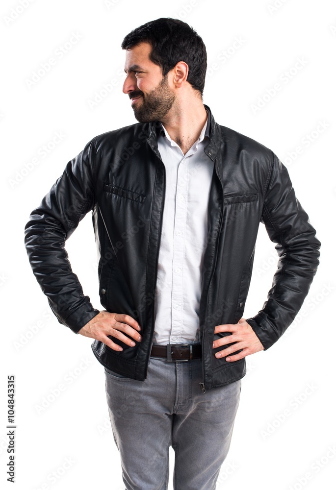 Fototapeta premium Man with leather jacket looking lateral