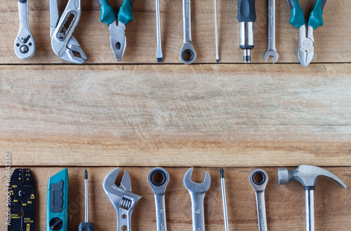 Set of tools on wooden background