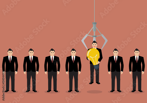 Businessman who has idea was pick by robotic claw