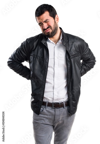 Man with leather jacket with back pain