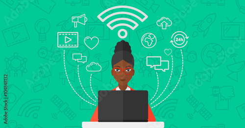 Woman working on laptop.