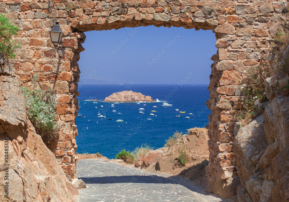 Sea view from the fortress arch, fence removed, Tossa del mar, Spain
