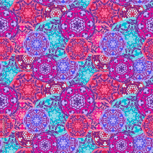 Gypsy seamless pattern of abstract multicolored round mandalas. Ethnic background