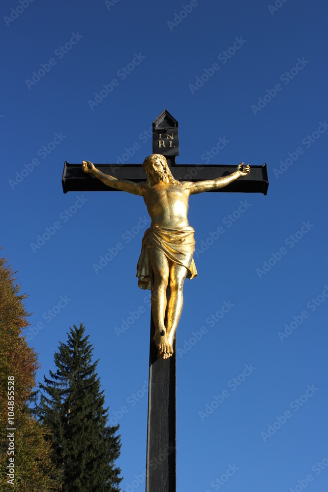 Cross in countryside with blue sky Cross in countryside with blue sky