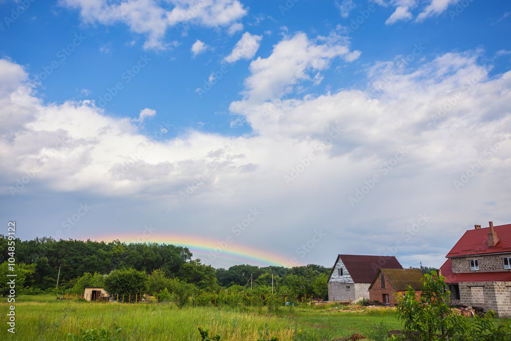 Blue sky and white cloud with sun light and rainbow Blue sky and white cloud with sun light and rainbow