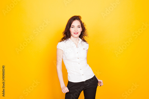 girl model on orange background © dmitriisimakov