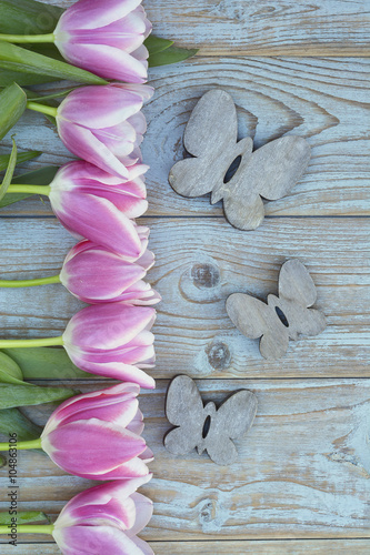 Fototapeta Naklejka Na Ścianę i Meble -  Old grey wooden background with purple white tulips,snowdrop and crocus summer spring decoration border in a line and empty copy space mock up layout
