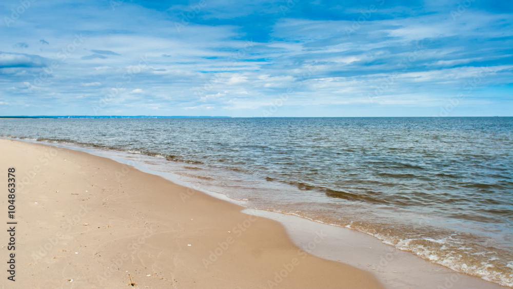 Time lapse of big white clouds moving over a Baltic Sea Time lapse of big white clouds moving over a Baltic Sea