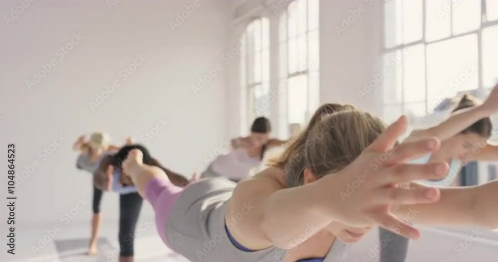Yoga class multi racial group of women exercising fitness healthy lifestyle