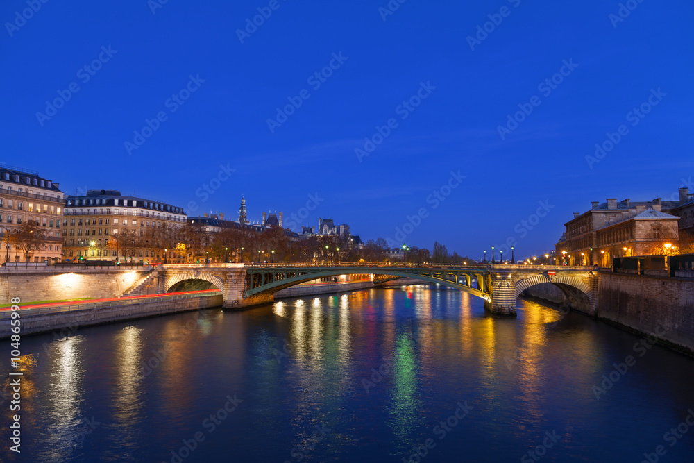 Seine river at night in Paris, France.