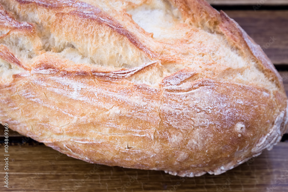 Bread on wooden background 