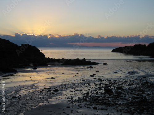 Sunset over the sea near Portpatrick, Scotland photo