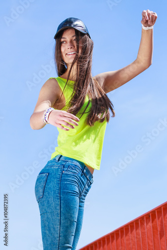 Portrait of carefree teenager girl outdoor.