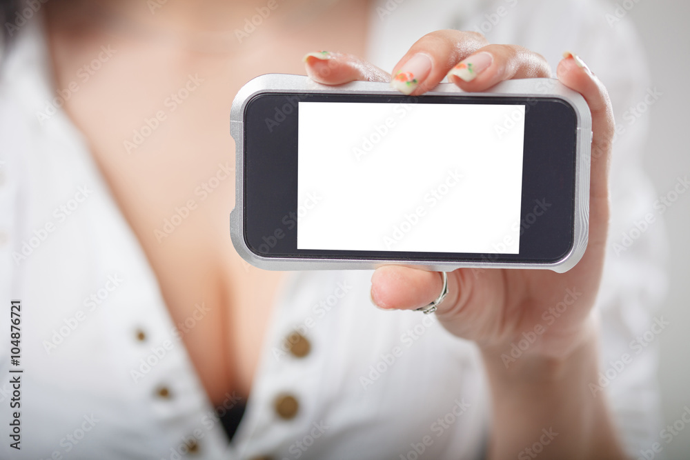 Close-up of a girl hand showing a horizontal blank smartphone sc