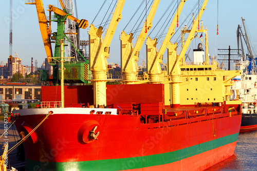 Sea cargo transportation. The ship in port. Trade business. photo