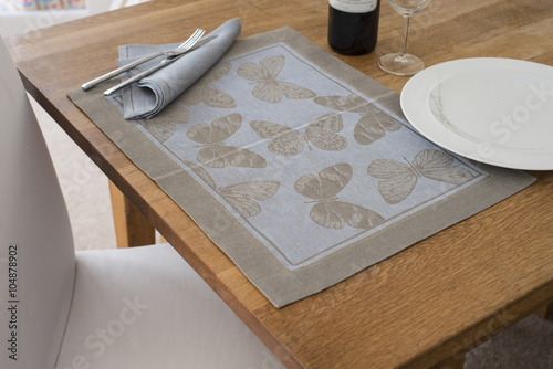 Rectangular Placemat with Embroidered Butterfly Design Laid on T