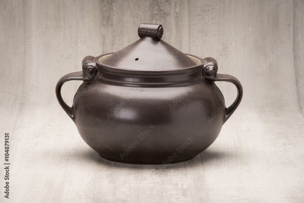 A Black Tureen or Soup Serving Bowl with Cover On A Black Tureen or Soup Serving Bowl with Cover On