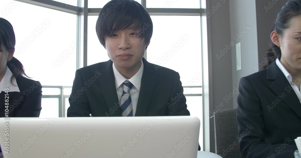 Fun Japanese professionals work at the office Fun Japanese professionals work at the office
