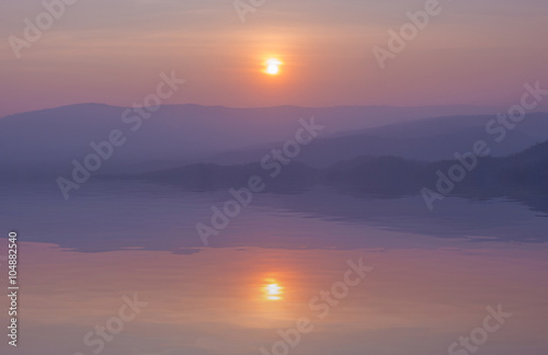sunset with mountain with water reflection  view from Pha Keb Ta