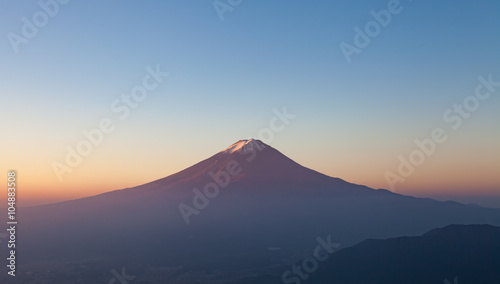 Top of mountain Fuji and sunrise sky in autumn season © torsakarin