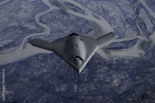 Unmanned Drone flying high over a city covered in snow and ice photo